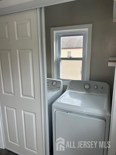 191 Fulton Street, Unit 2 Woodbridge, NJ 07095 - Photo 9 of 22 a utility room with dryer and washer