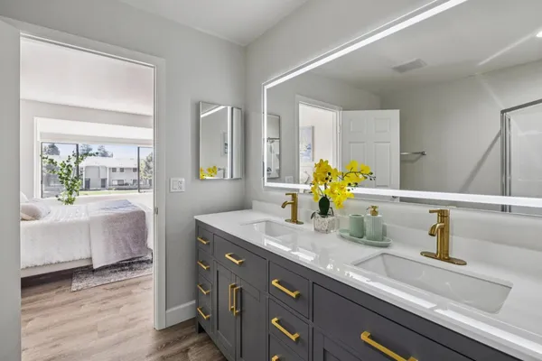 an aerial view of a house with a garden and pool