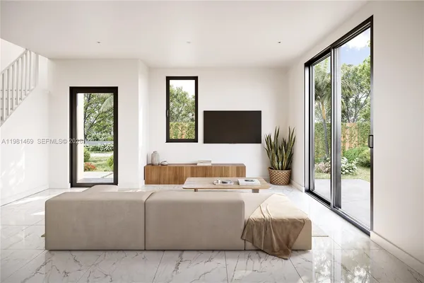 a bedroom with a large bed and a large window