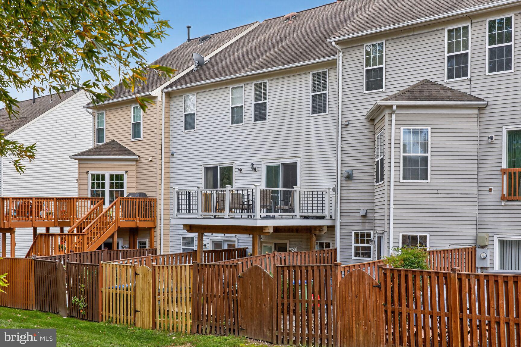 13486 Grouserun Lane Bristow, VA 20136 - Photo 20 of 20 a front view of a house with a yard