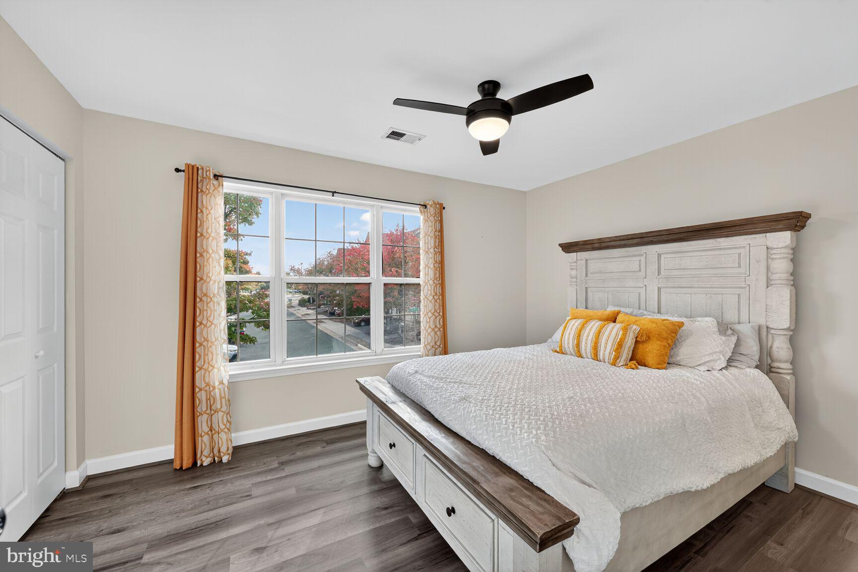 13486 Grouserun Lane Bristow, VA 20136 - Photo 9 of 20 a bedroom with a bed and window