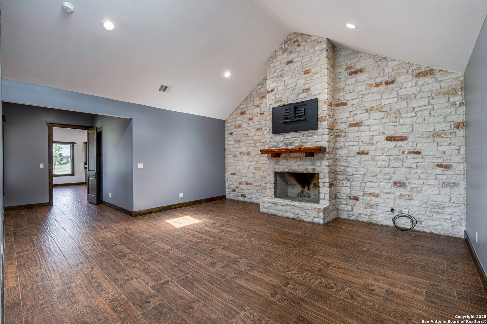 9560 Old Colony Line Road Dale, TX 78616 - Photo 14 of 41 a view of a livingroom with a fireplace and window