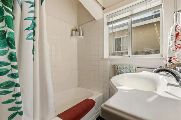 a bathroom with a sink and toilet