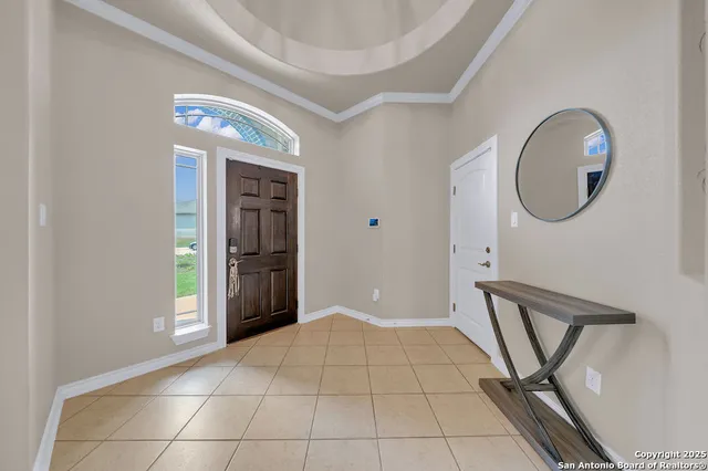 a view of an entryway with a workspace