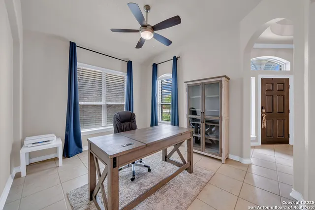 a view of a workspace with furniture