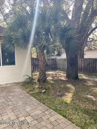 a house view with backyard space