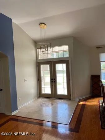 an empty room with windows