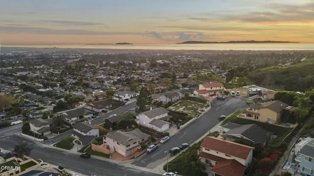 an aerial view of residential building with parking space