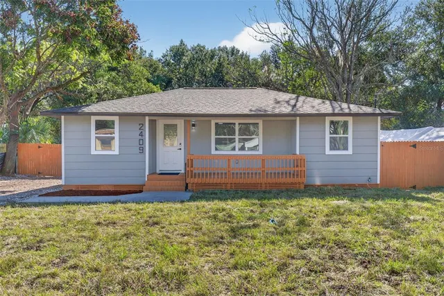 a house view with a garden space