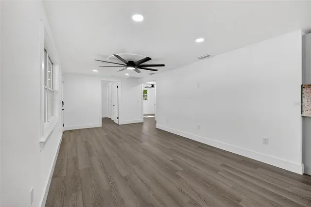 a kitchen with a refrigerator stove and sink