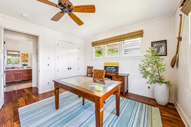 a workspace with furniture and wooden floor