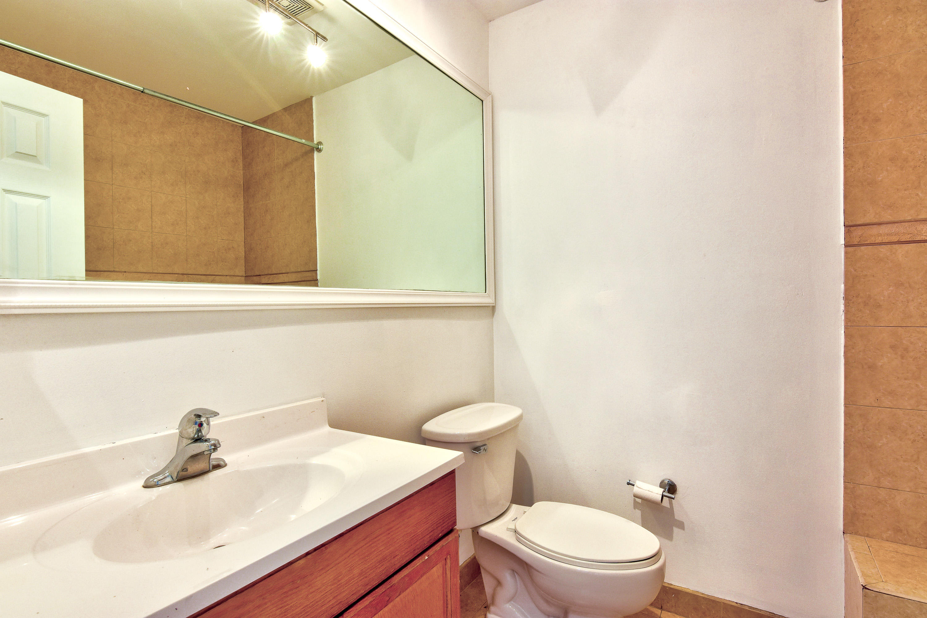 1149 Northwest 13th Street, Unit 7 Boca Raton, FL 33486 - Photo 5 of 14 1149 downstairs bath