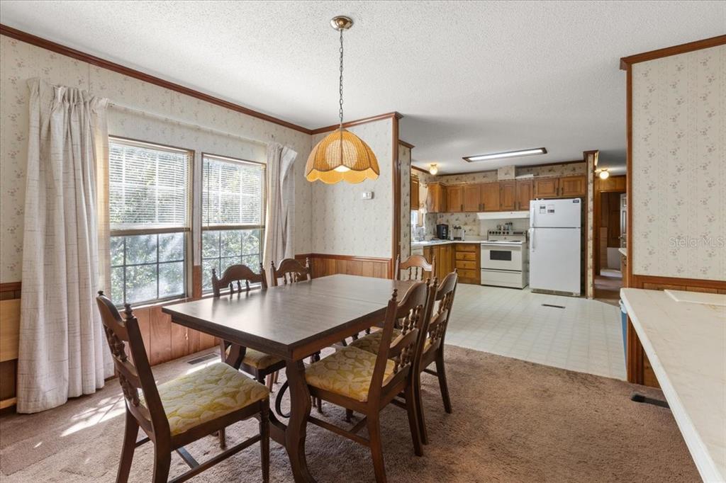4945 Southwest Highway 358 Steinhatchee, FL 32359 - Photo 11 of 35 a dining room with furniture and window