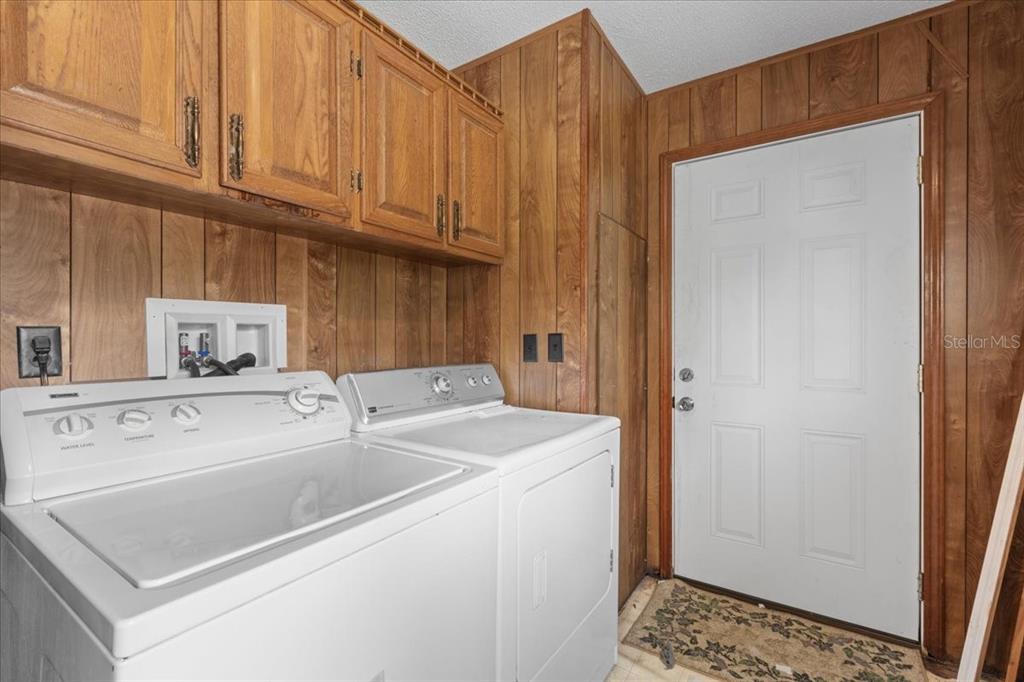 4945 Southwest Highway 358 Steinhatchee, FL 32359 - Photo 25 of 35 a utility room with dryer and washer