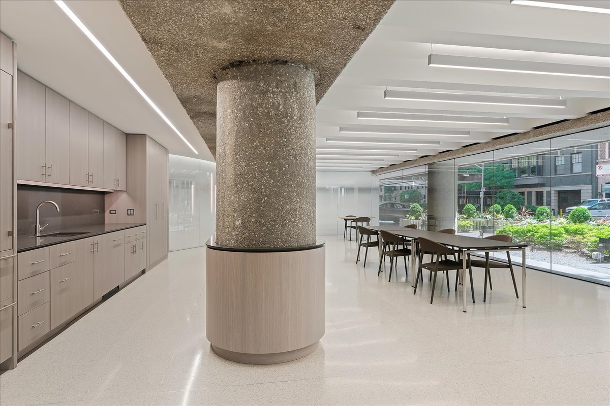 200 East Delaware Place, Unit 13C Chicago, IL 60611 - Photo 26 of 31 a dining room with furniture and a kitchen view