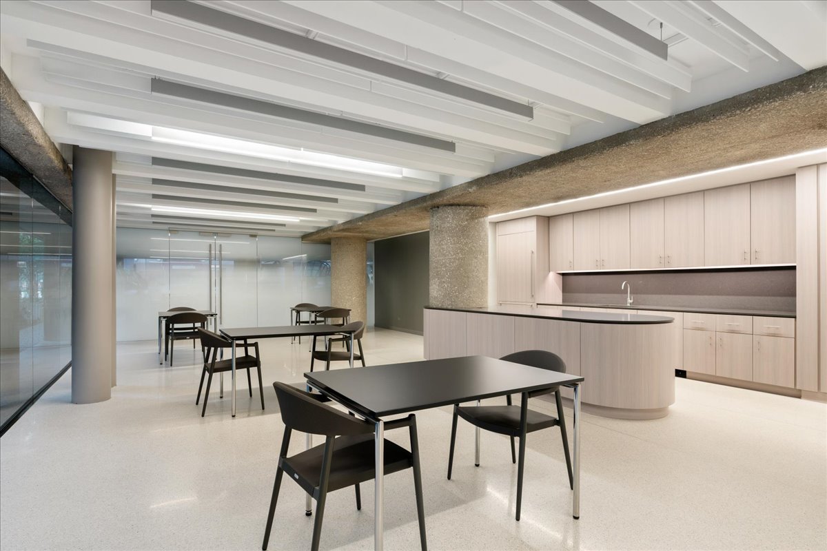 200 East Delaware Place, Unit 13C Chicago, IL 60611 - Photo 27 of 31 a view of a dining room with furniture and a chandelier