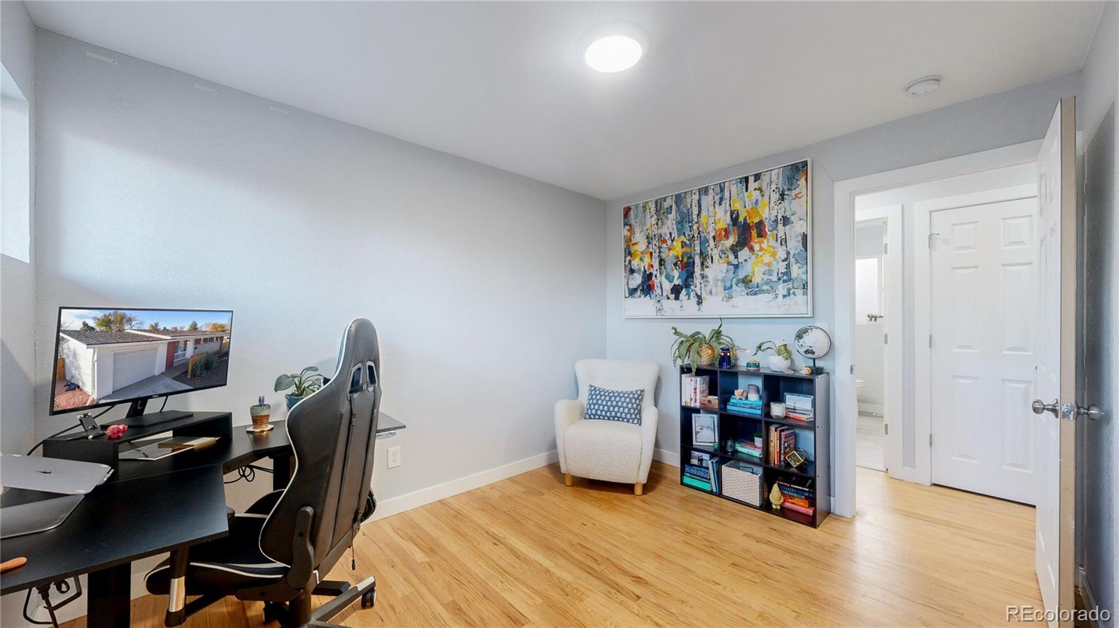 9420 Ridge Road Arvada, CO 80002 - Photo 18 of 31 a view of a workspace with furniture and workspace