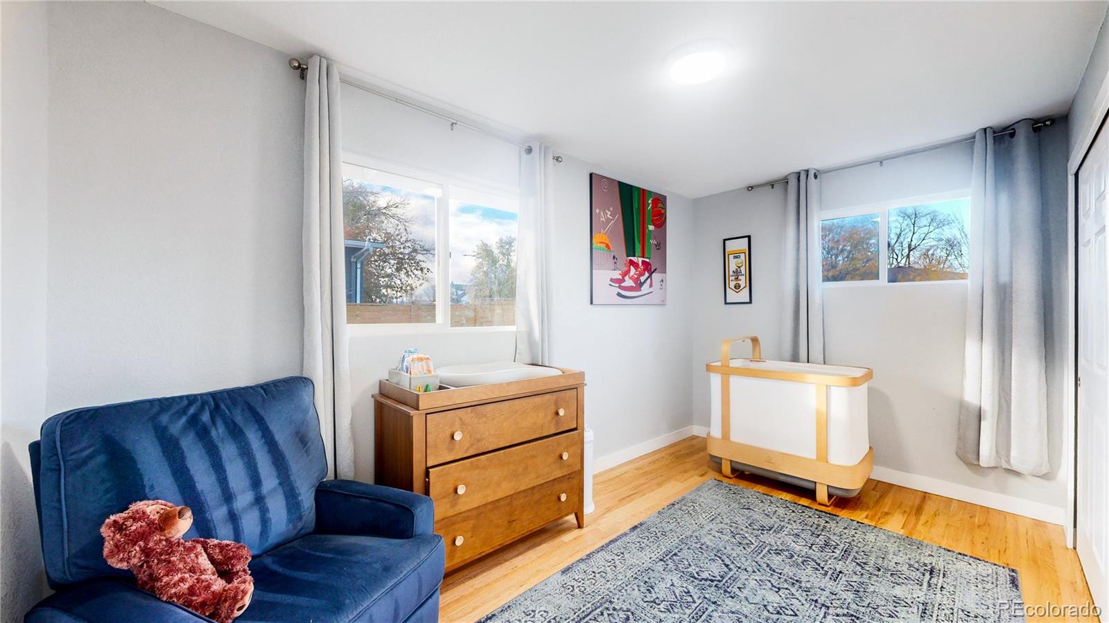 9420 Ridge Road Arvada, CO 80002 - Photo 19 of 31 a living room with furniture and a window