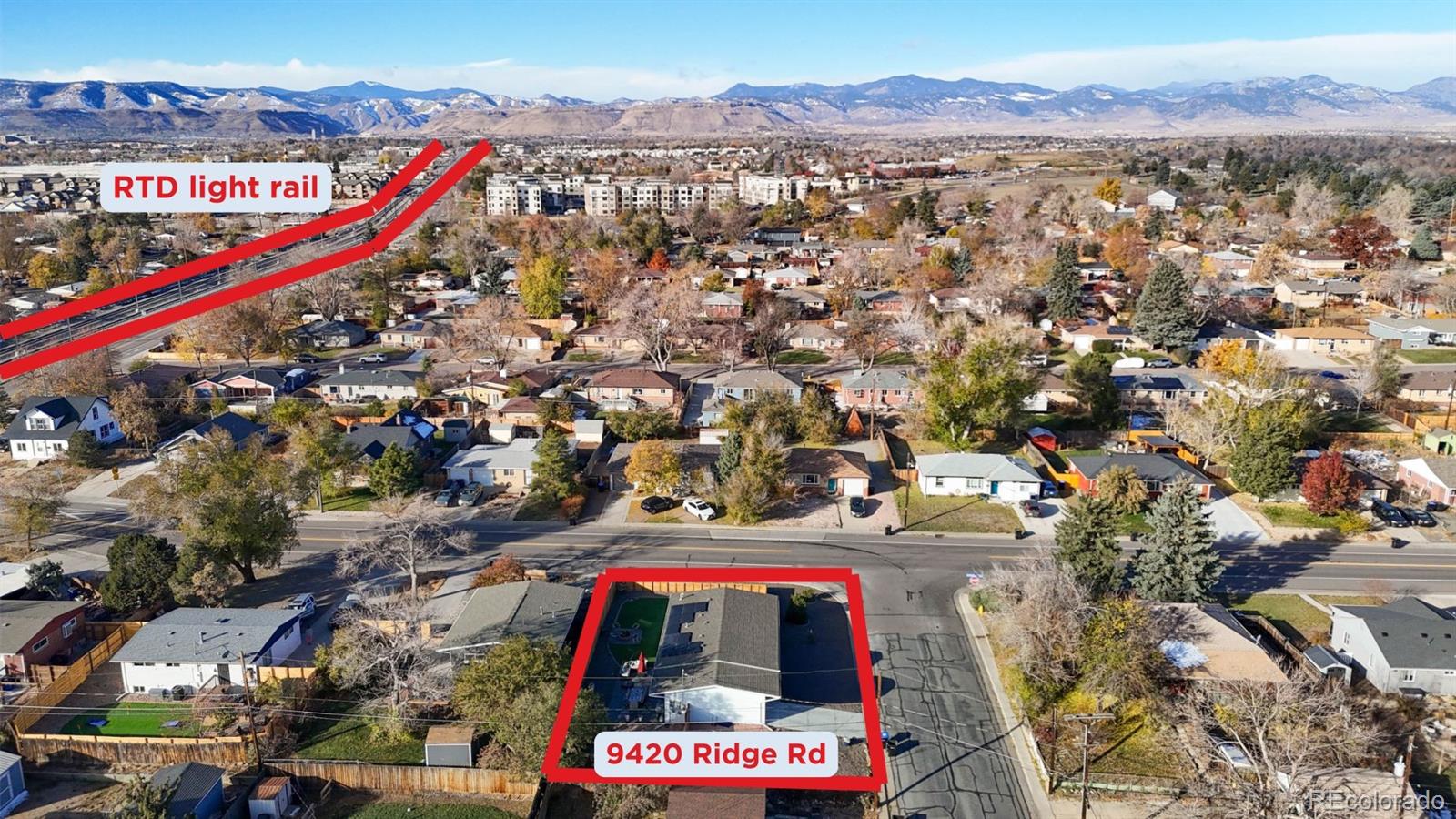 9420 Ridge Road Arvada, CO 80002 - Photo 28 of 31 a picture of city and mountain