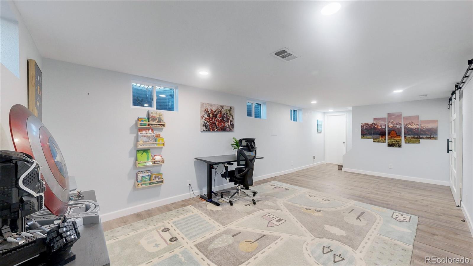 9420 Ridge Road Arvada, CO 80002 - Photo 10 of 31 a view of a workspace with furniture