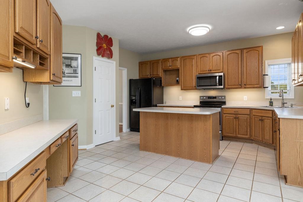30 Sir Robin Road Waynesboro, VA 22980 - Photo 11 of 62 a kitchen with stainless steel appliances a refrigerator sink and microwave
