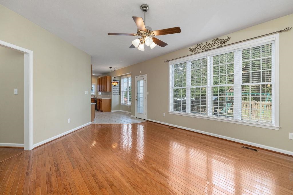 30 Sir Robin Road Waynesboro, VA 22980 - Photo 18 of 62 a view of an empty room with wooden floor and a window