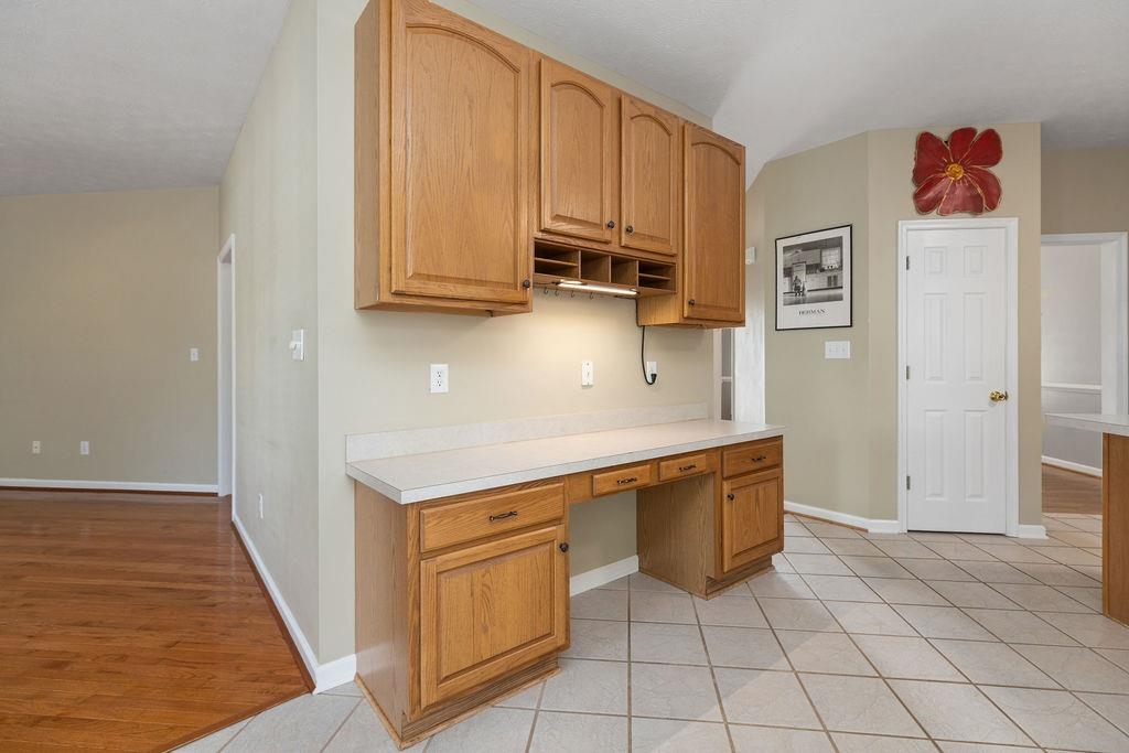 30 Sir Robin Road Waynesboro, VA 22980 - Photo 22 of 62 a kitchen with stainless steel appliances granite countertop a refrigerator and a sink