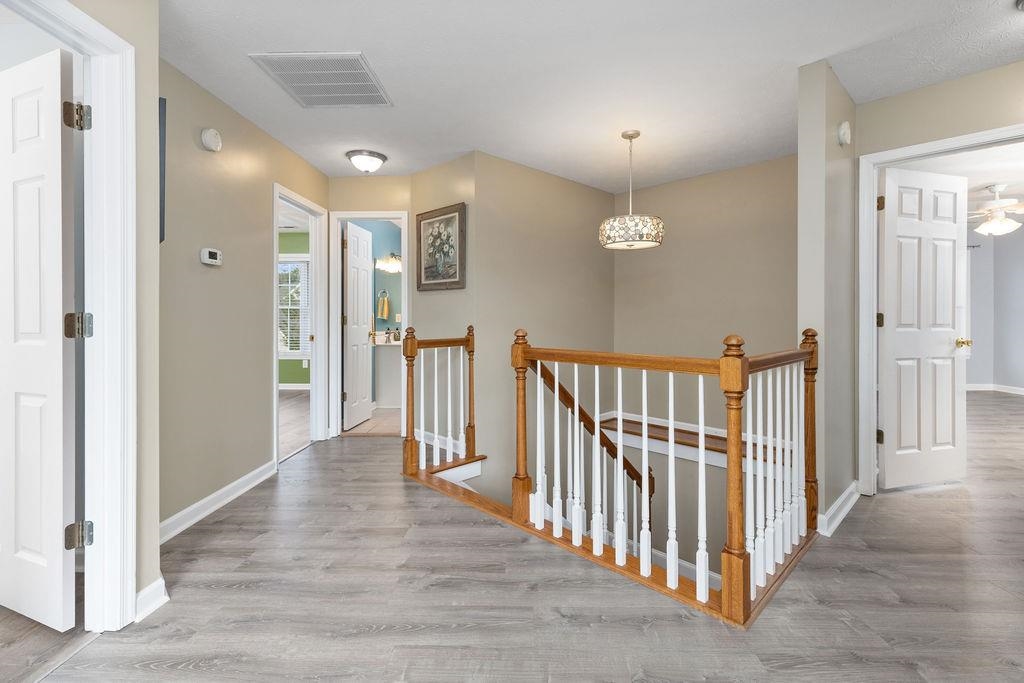 30 Sir Robin Road Waynesboro, VA 22980 - Photo 26 of 62 a view of a hallway with wooden floor and entryway