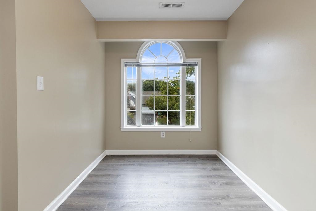 30 Sir Robin Road Waynesboro, VA 22980 - Photo 27 of 62 an empty room with wooden floor and a window