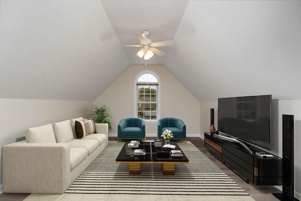 30 Sir Robin Road Waynesboro, VA 22980 - Photo 30 of 62 a living room with furniture a rug and a flat screen tv