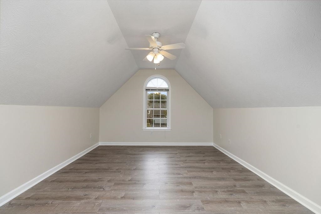 30 Sir Robin Road Waynesboro, VA 22980 - Photo 31 of 62 a view of an empty room with wooden floor and a window