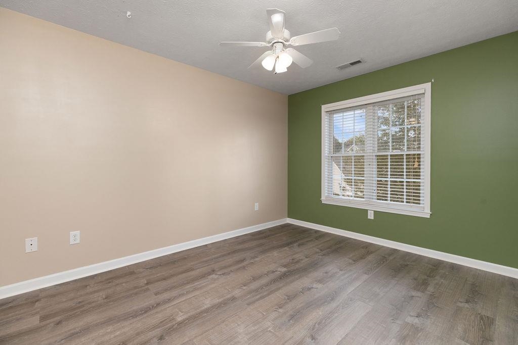 30 Sir Robin Road Waynesboro, VA 22980 - Photo 41 of 62 wooden floor in an empty room with a window