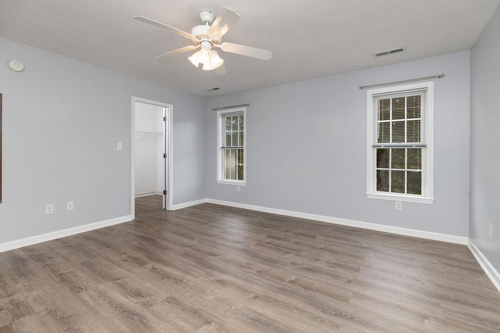 30 Sir Robin Road Waynesboro, VA 22980 - Photo 45 of 62 a view of an empty room with a window and wooden floor