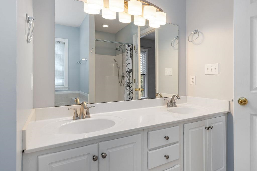 30 Sir Robin Road Waynesboro, VA 22980 - Photo 48 of 62 a bathroom with a sink double vanity and a mirror