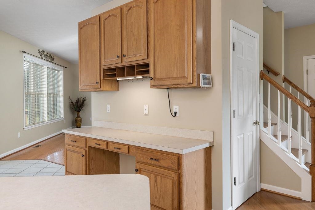 30 Sir Robin Road Waynesboro, VA 22980 - Photo 7 of 62 a kitchen with stainless steel appliances granite countertop a refrigerator and a stove