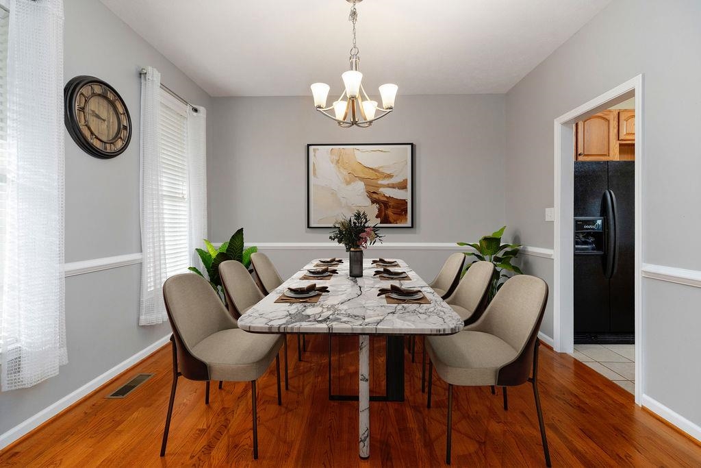 30 Sir Robin Road Waynesboro, VA 22980 - Photo 8 of 62 a dining room with furniture and wooden floor
