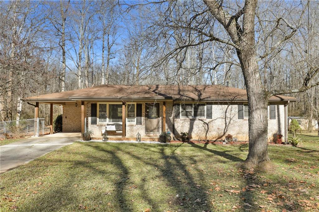 2077 Mulkey Road Southwest Marietta, GA 30008 - Photo 1 of 1 4-sided brick ranch