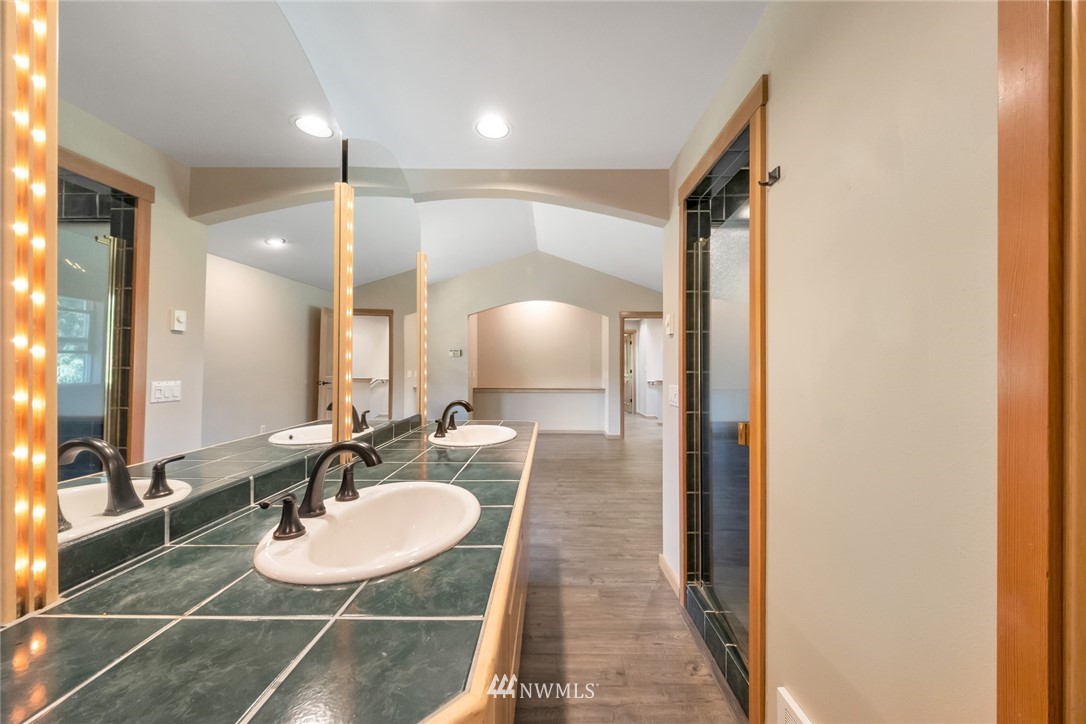 23304 35th Avenue Southeast Bothell, WA 98021 - Photo 18 of 34 a bathroom with a sink and a mirror