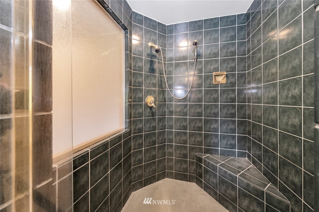 23304 35th Avenue Southeast Bothell, WA 98021 - Photo 20 of 34 a bathroom with a shower