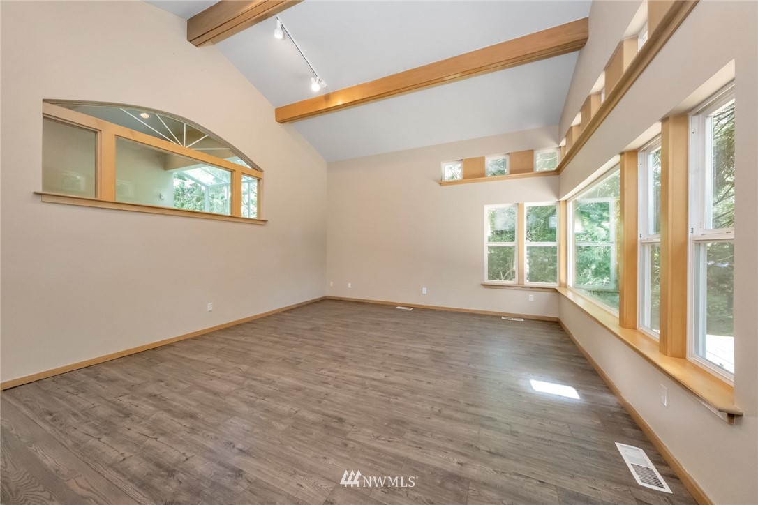 23304 35th Avenue Southeast Bothell, WA 98021 - Photo 5 of 34 a view of an empty room with a window