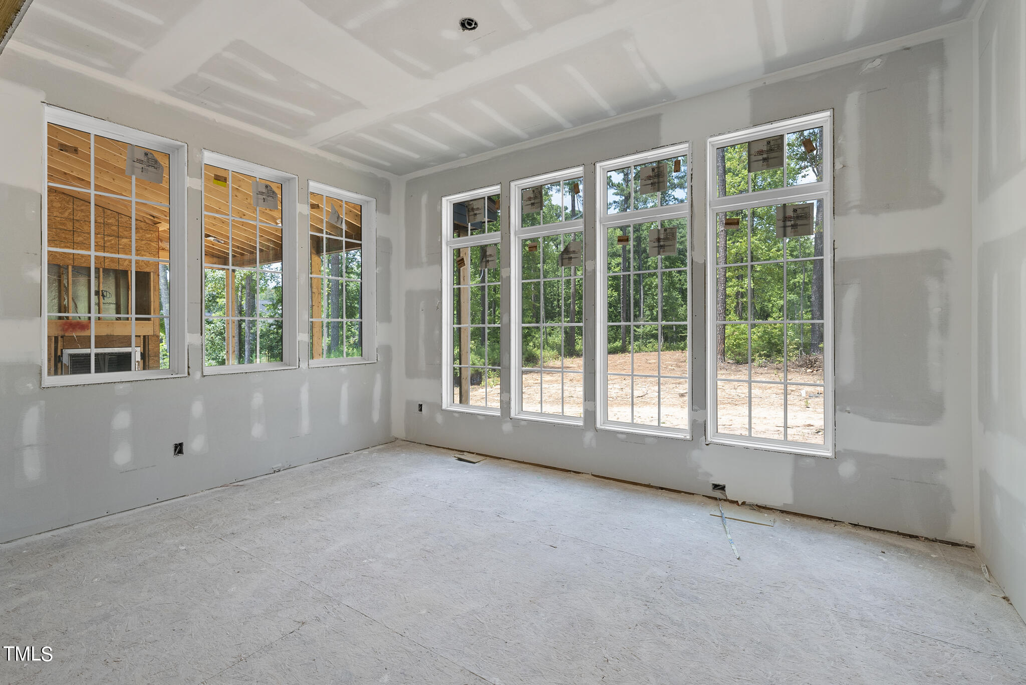 1420 Starry Night Court Raleigh, NC 27613 - Photo 12 of 33 a view of an empty room with a window