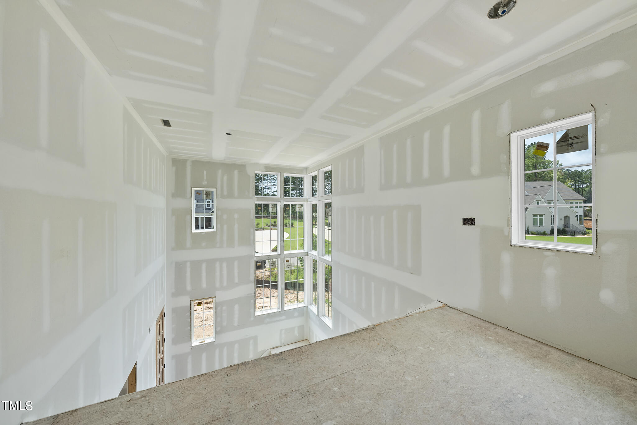 1420 Starry Night Court Raleigh, NC 27613 - Photo 20 of 33 an empty room with windows