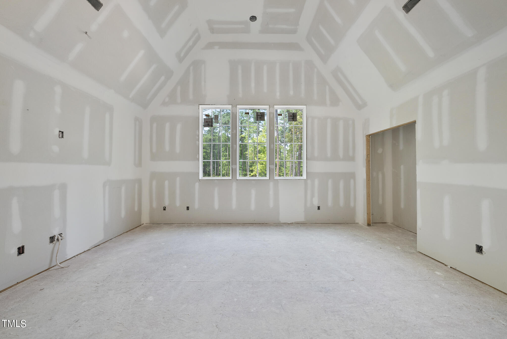 1420 Starry Night Court Raleigh, NC 27613 - Photo 21 of 33 a view of an empty room with a window