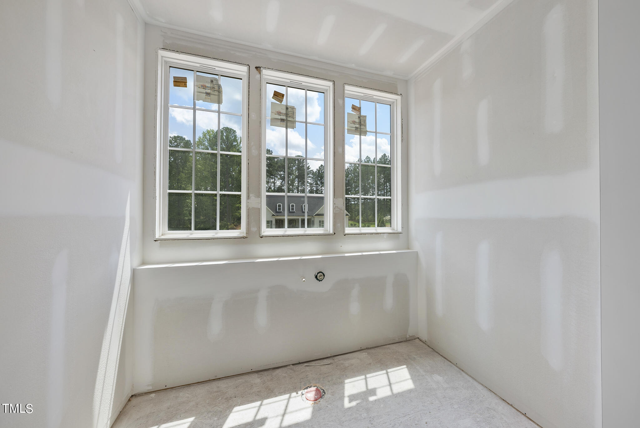 1420 Starry Night Court Raleigh, NC 27613 - Photo 32 of 33 a view of empty room with windows