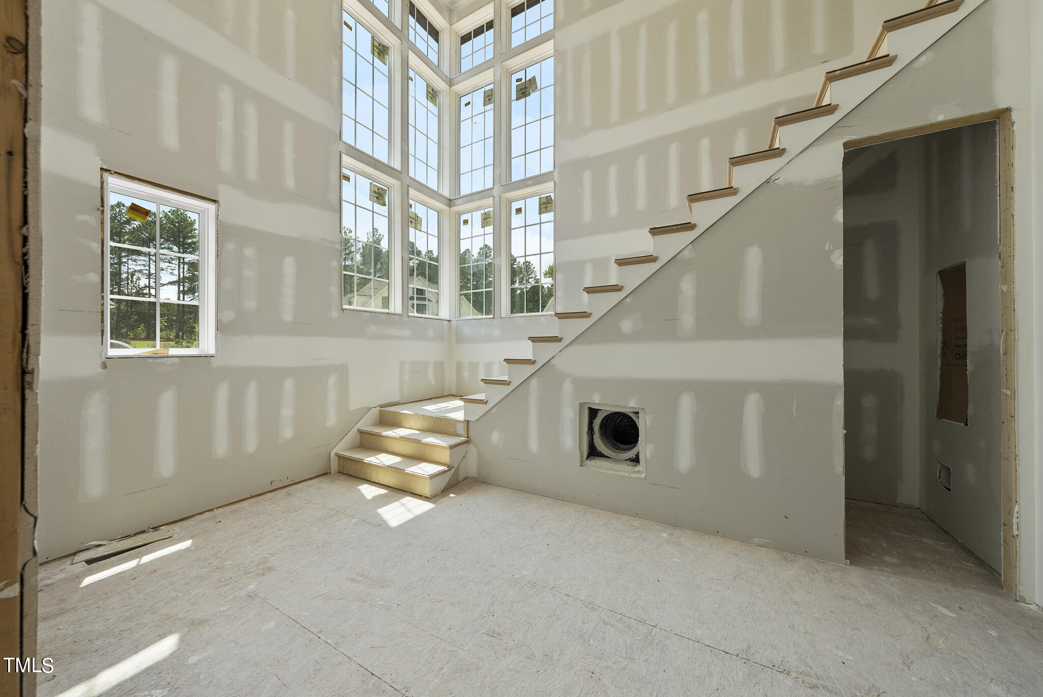 1420 Starry Night Court Raleigh, NC 27613 - Photo 4 of 33 a living room with windows