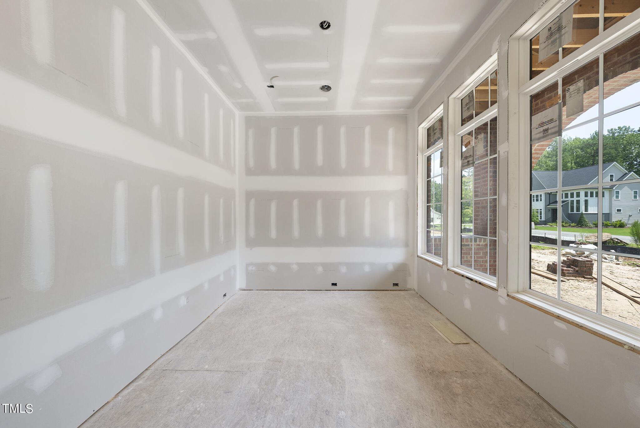 1420 Starry Night Court Raleigh, NC 27613 - Photo 6 of 33 a view of an empty room with a window