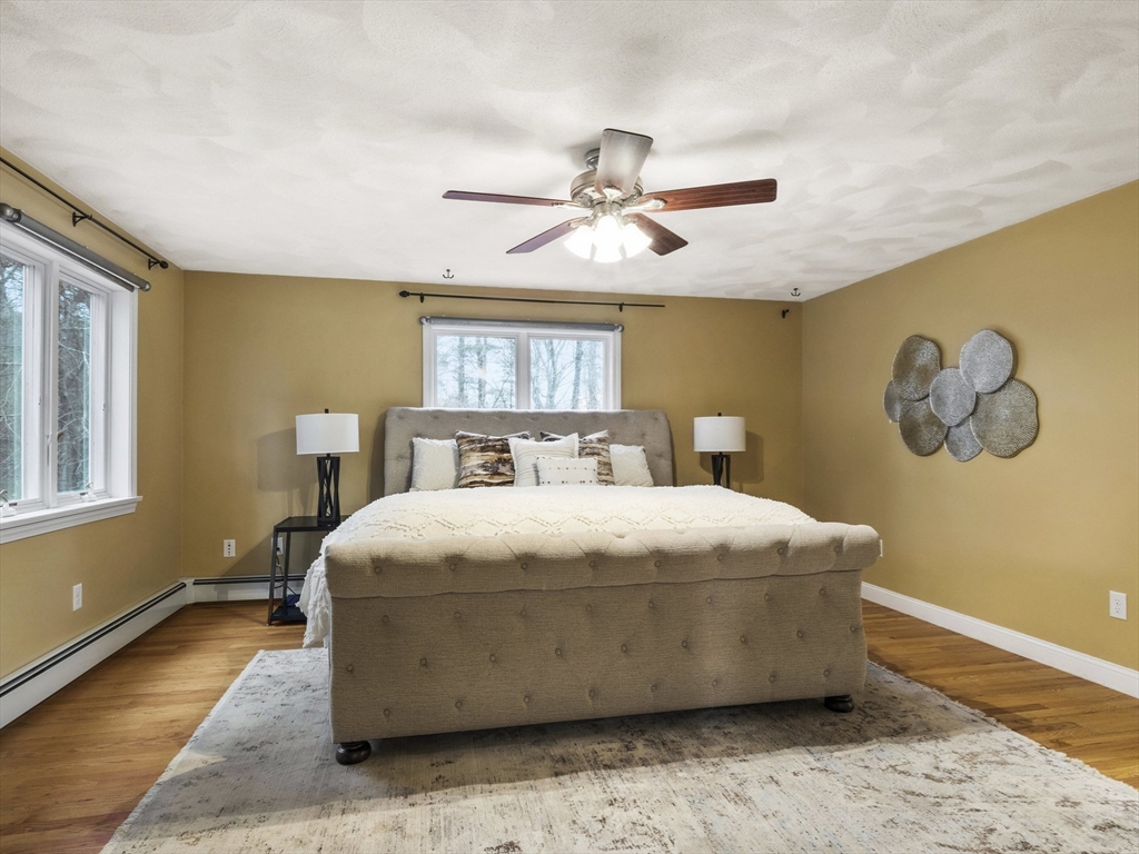 50 Bare Hill Road Topsfield, MA 01983 - Photo 23 of 42 a bedroom with a bed and window