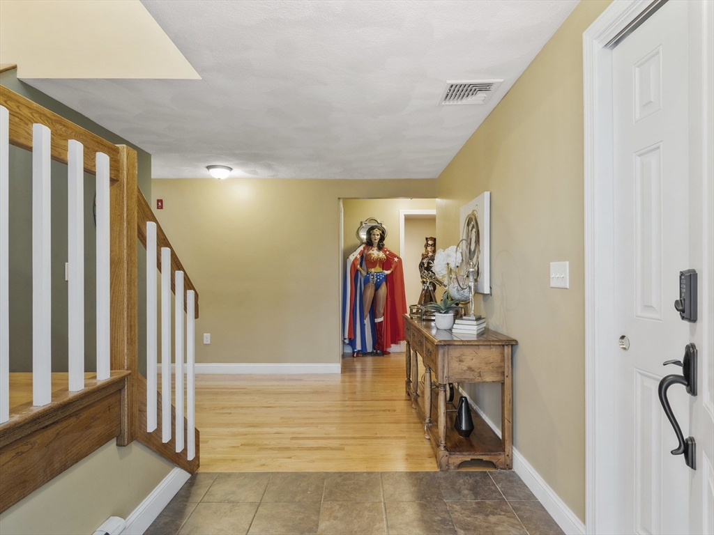 50 Bare Hill Road Topsfield, MA 01983 - Photo 4 of 42 a view of a hallway with a entryway