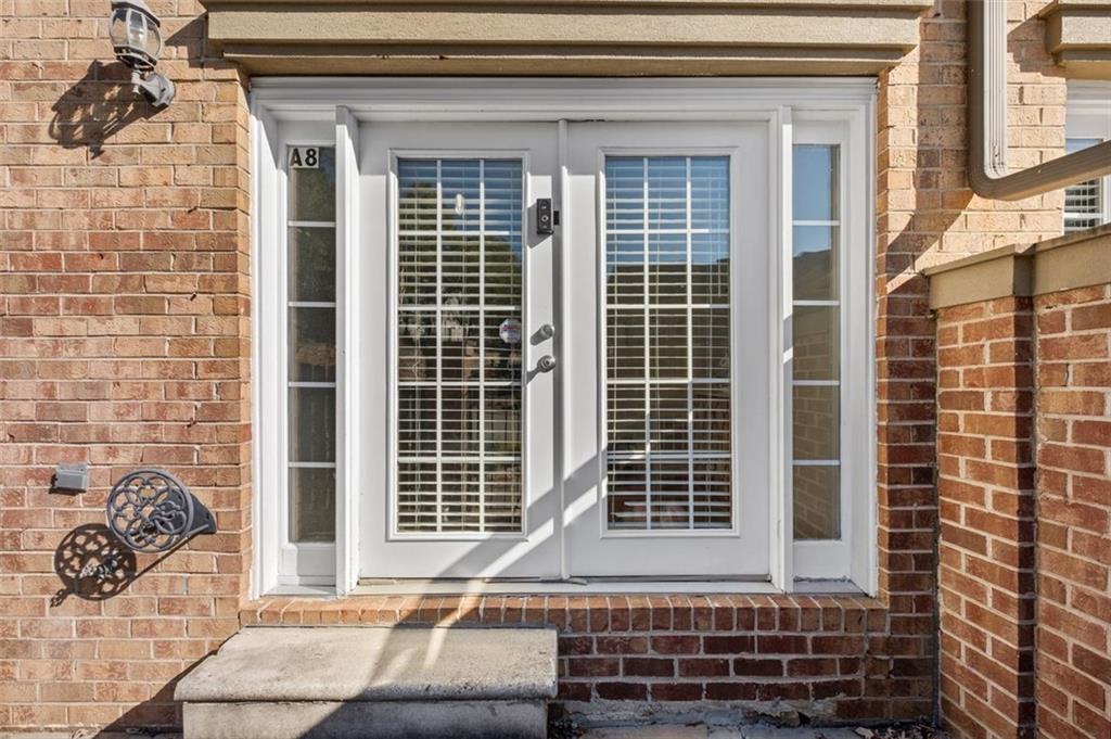 6980 Roswell Road, Unit A8 Atlanta, GA 30328 - Photo 26 of 26 a front view of a house