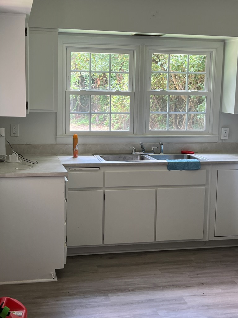 2211 8th Street Columbus, GA 31906 - Photo 7 of 16 large kitchen with LPV flooring